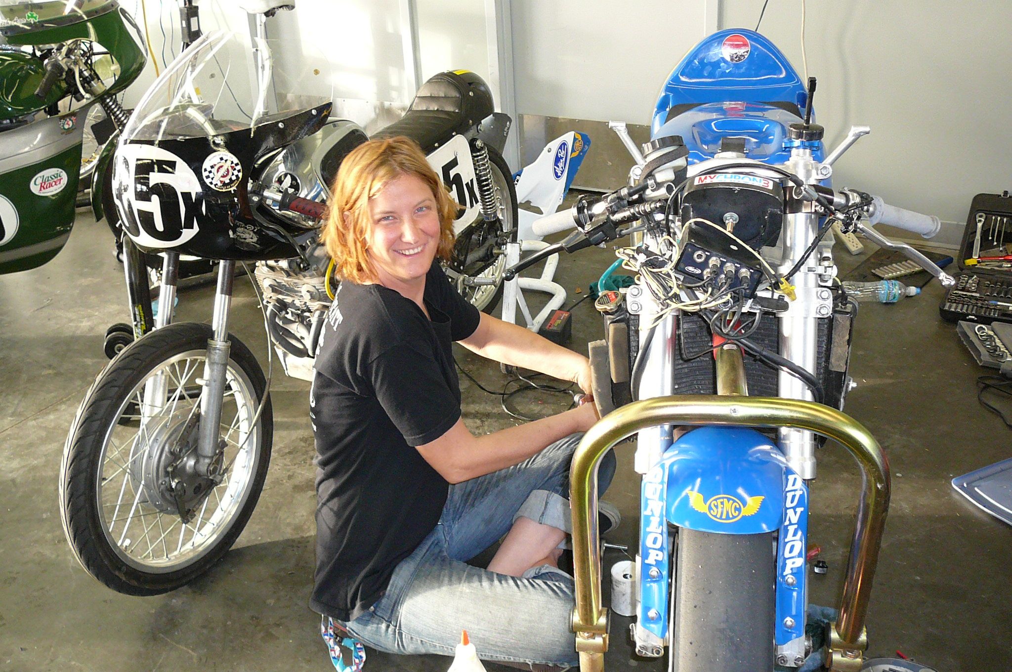 Women Who Ride: Jennifer Bromme working on her bike
